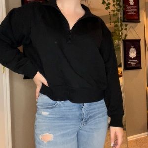 Black cropped quarter zip sweater